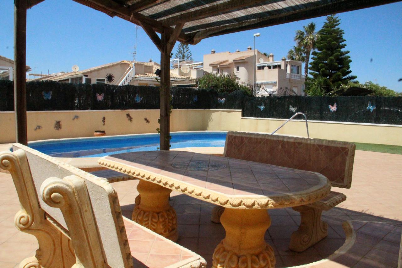 Akilar 1716498377IRWABO ref 1822 mobile 3 Dining by your private pool Playa Flamenca