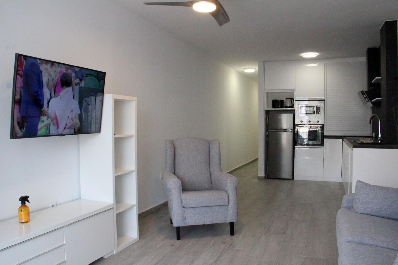 Akilar 1554131329TLDQOX ref 1741 mobile 4 living room and ent centre Villamartin Plaza