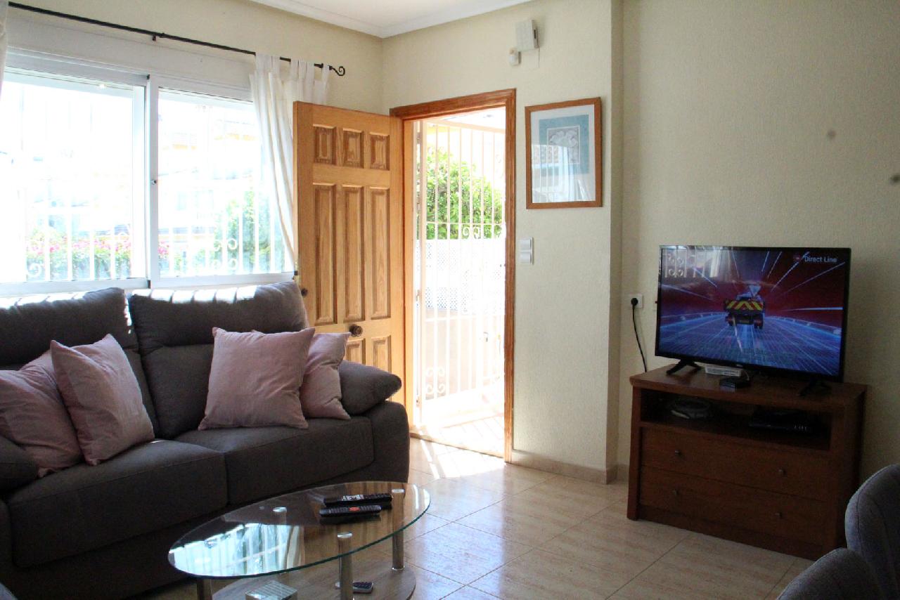 Akilar 1521881460TQWANP ref 1712 mobile 5 Spacious living room full TV and FREE WIFI Playa Flamenca