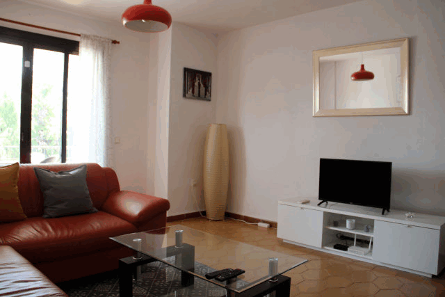 Akilar 1592602574EHRMJQ ref 1757 mobile 3 Living room with UK TV and FREE wifi Villamartin Plaza